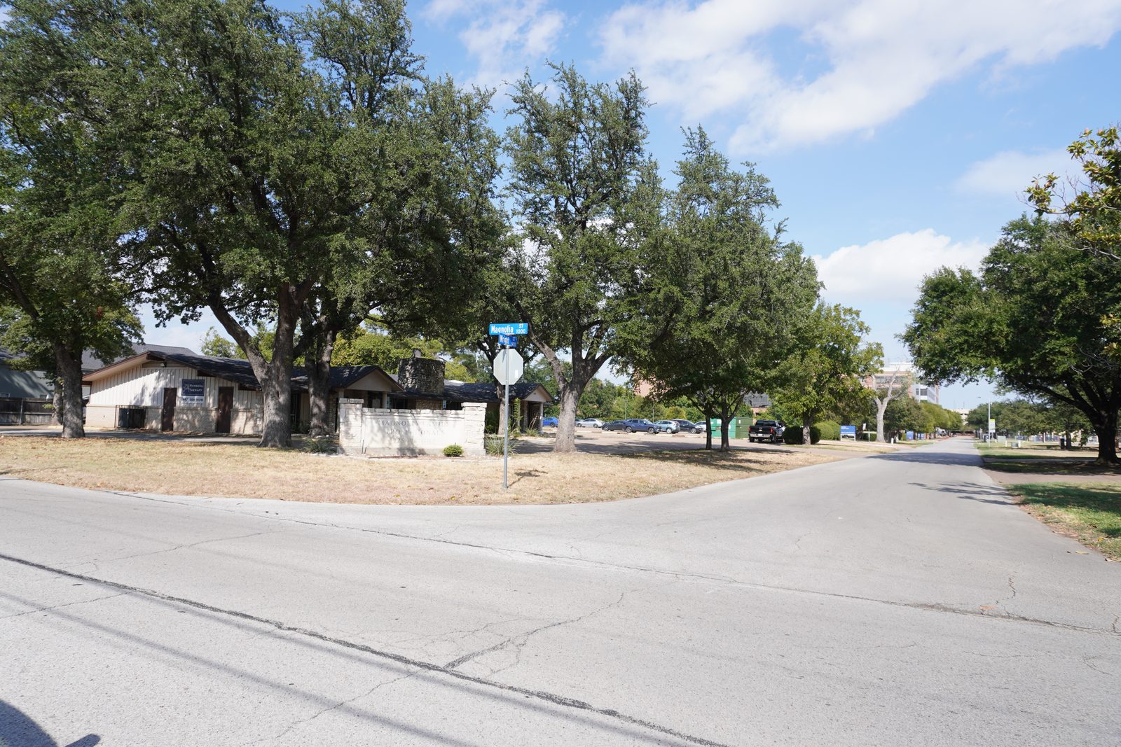 The property seen from the street corner, with the hospital district beyond.